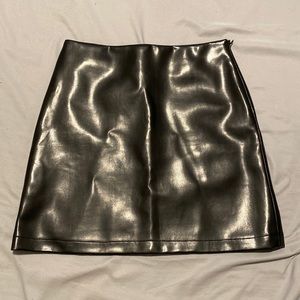 Black pleather mini skirt with lining - fits like a small or extra small